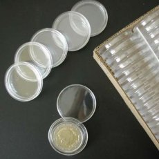 10 Capsules 23 mm voor €0,20 munten